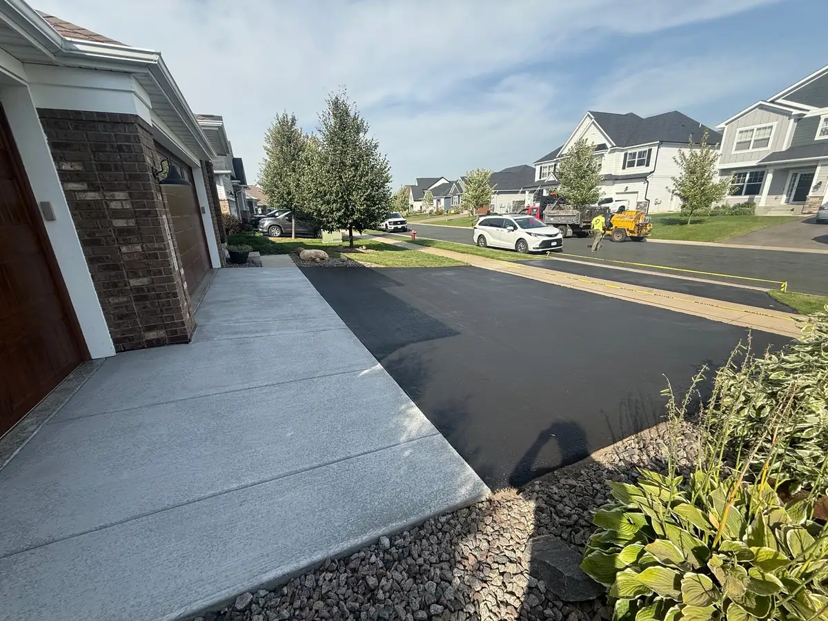 Asphalt driveway paving with concrete edging